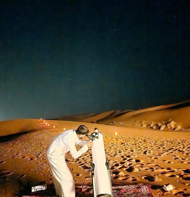 Telescope set up for stargazing in the desert